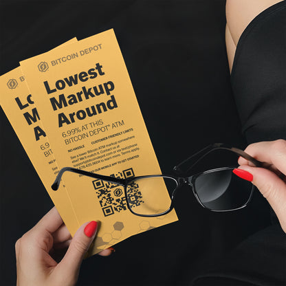 two double sided rack cards in yellow with person holding them and glasses