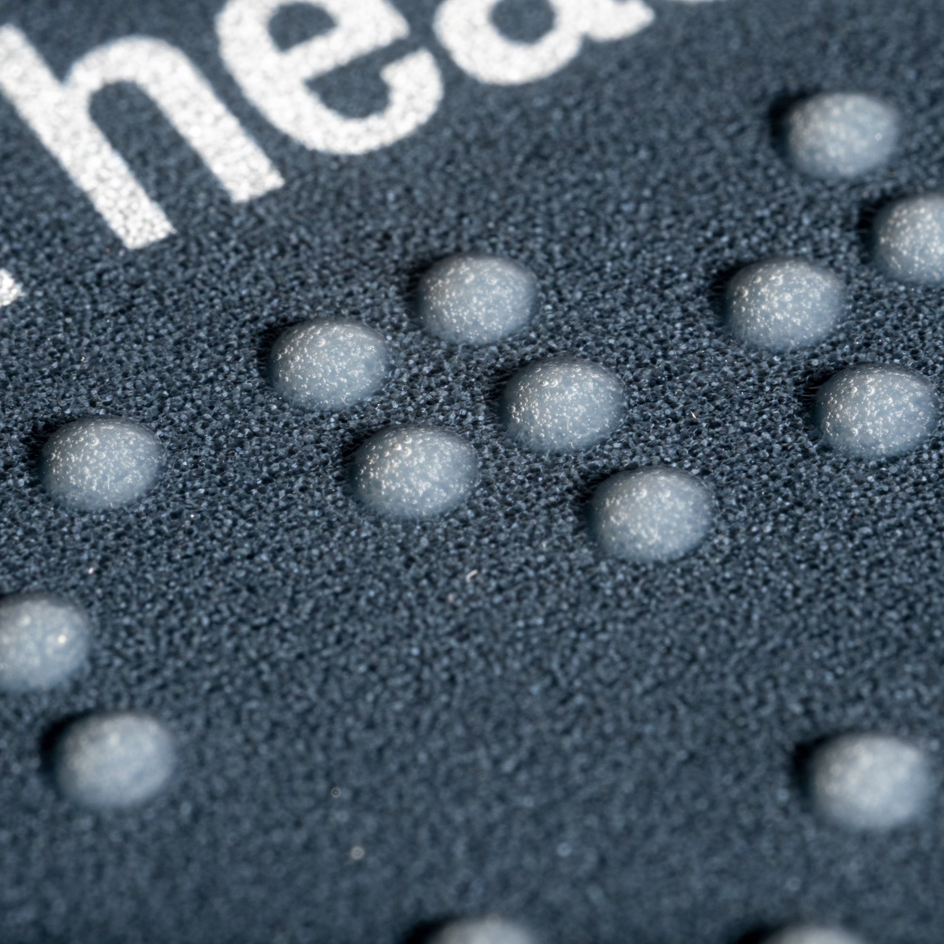 Close up of braille dots.