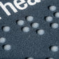 Close up of braille dots.